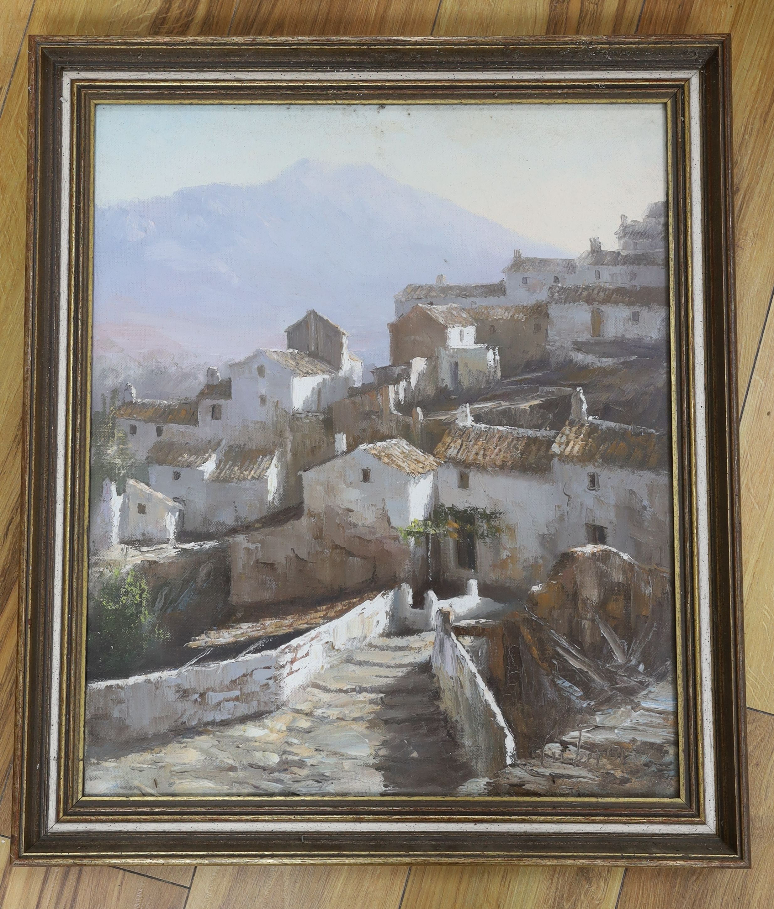 Manuel Cuberos (1933-), oil on canvas, View of a Spanish village, signed, 54 x 45cm